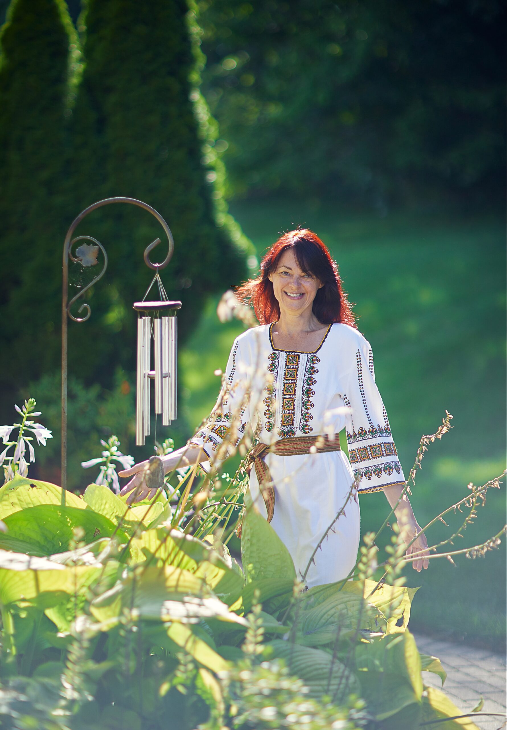 European woman standing in grass