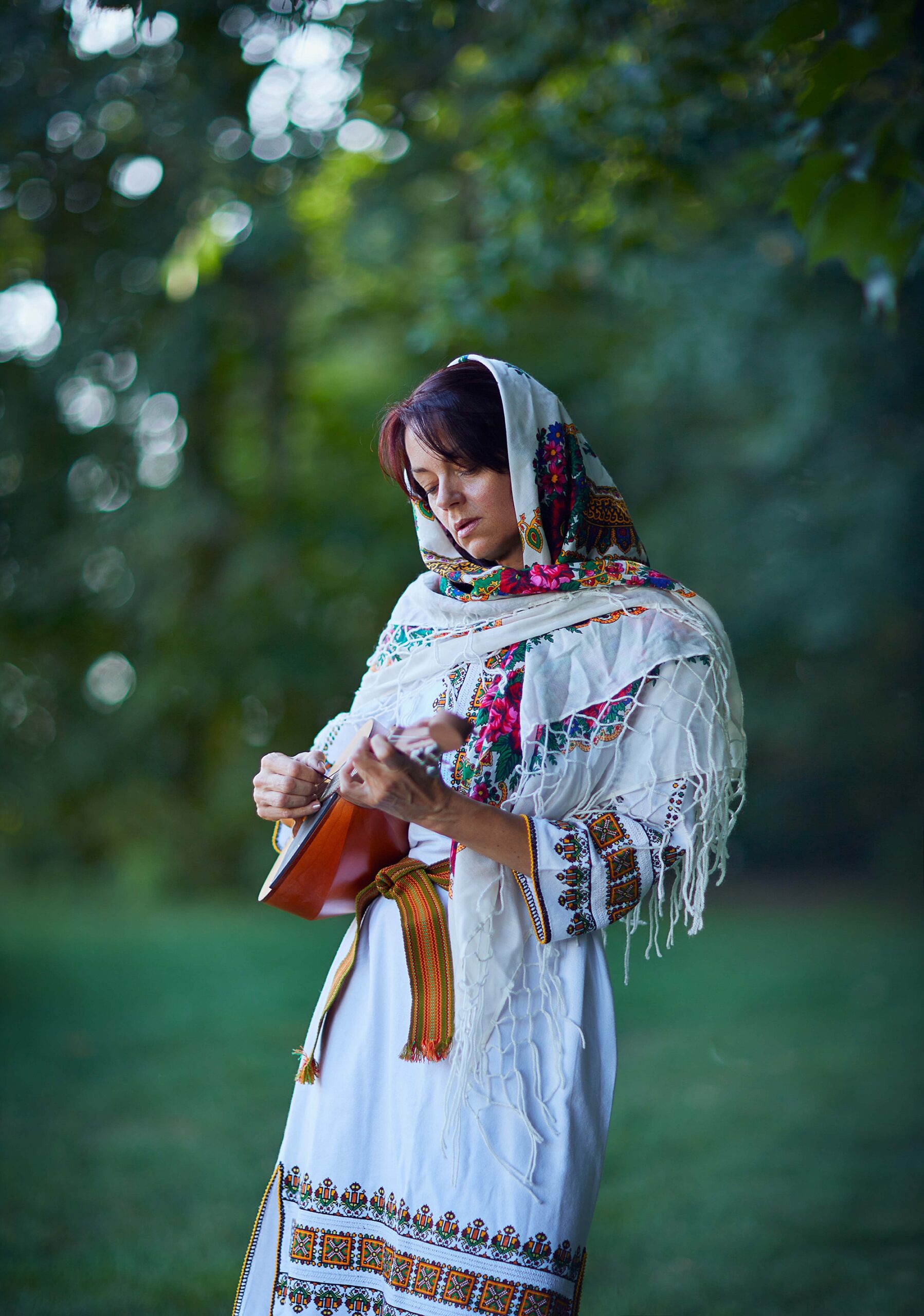 Ukrainian woman playing guitar