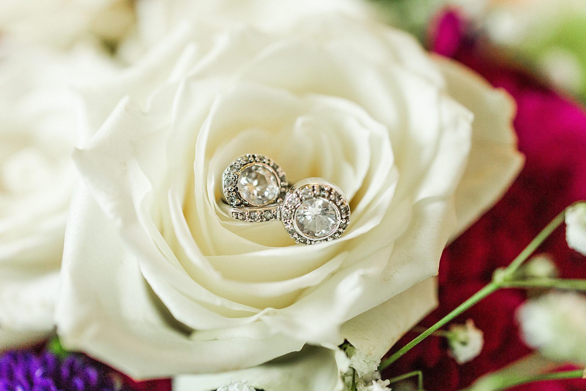 family heirloom earrings with white flowers 