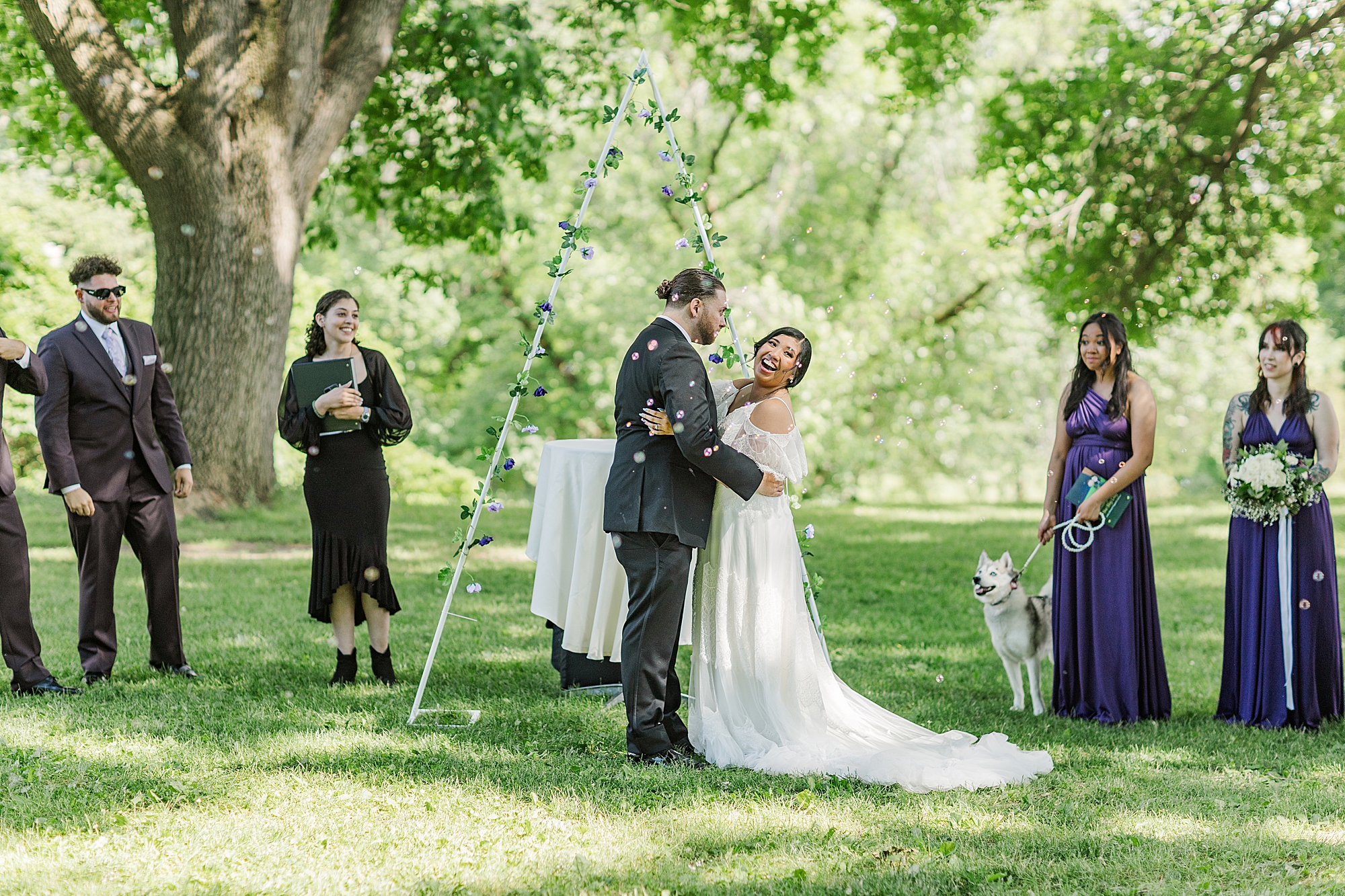 bride and groom embracing during wedding ceremony 