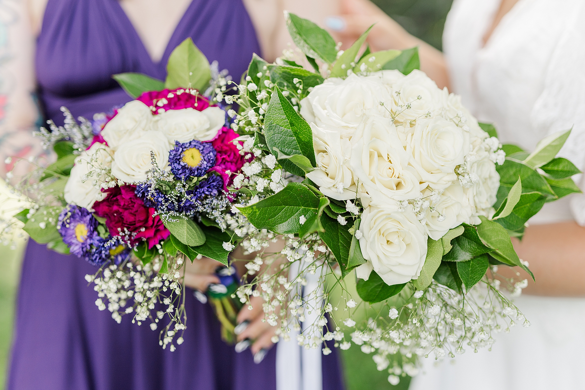 bridesmaids holding bouquet with flowers 