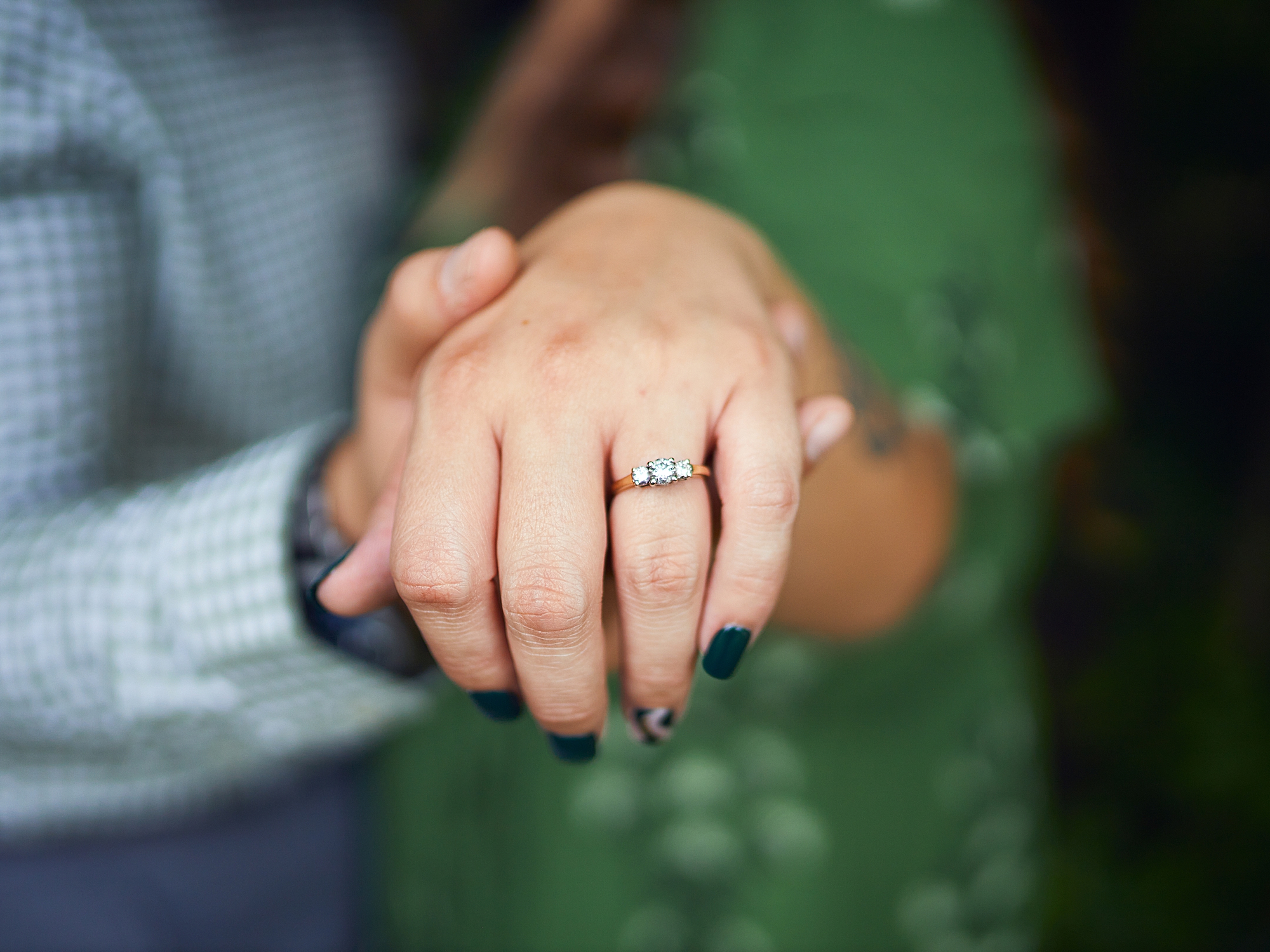 girlfriend wearing engagement ring 