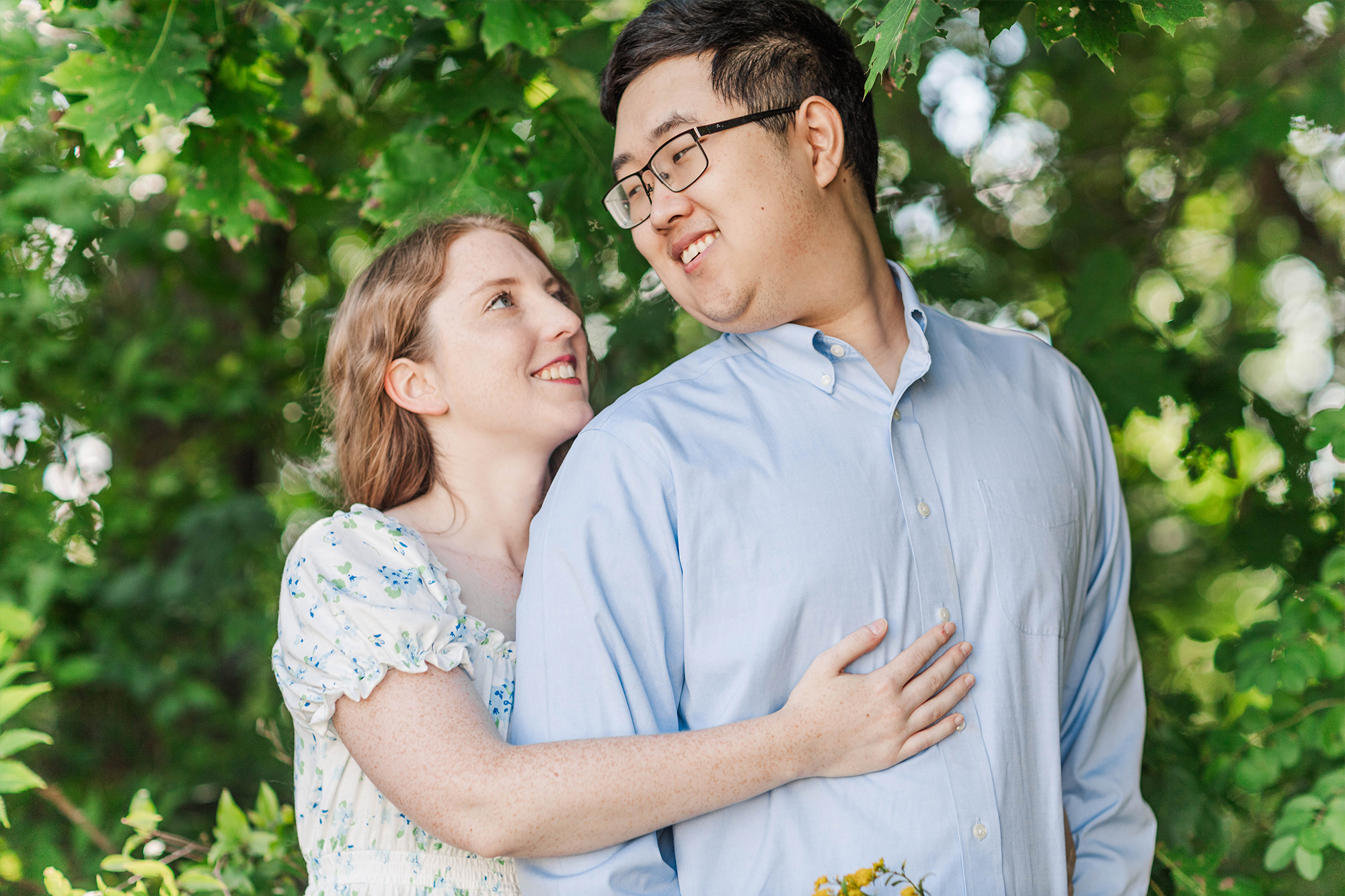 boyfriend and girlfriend smiling at each other