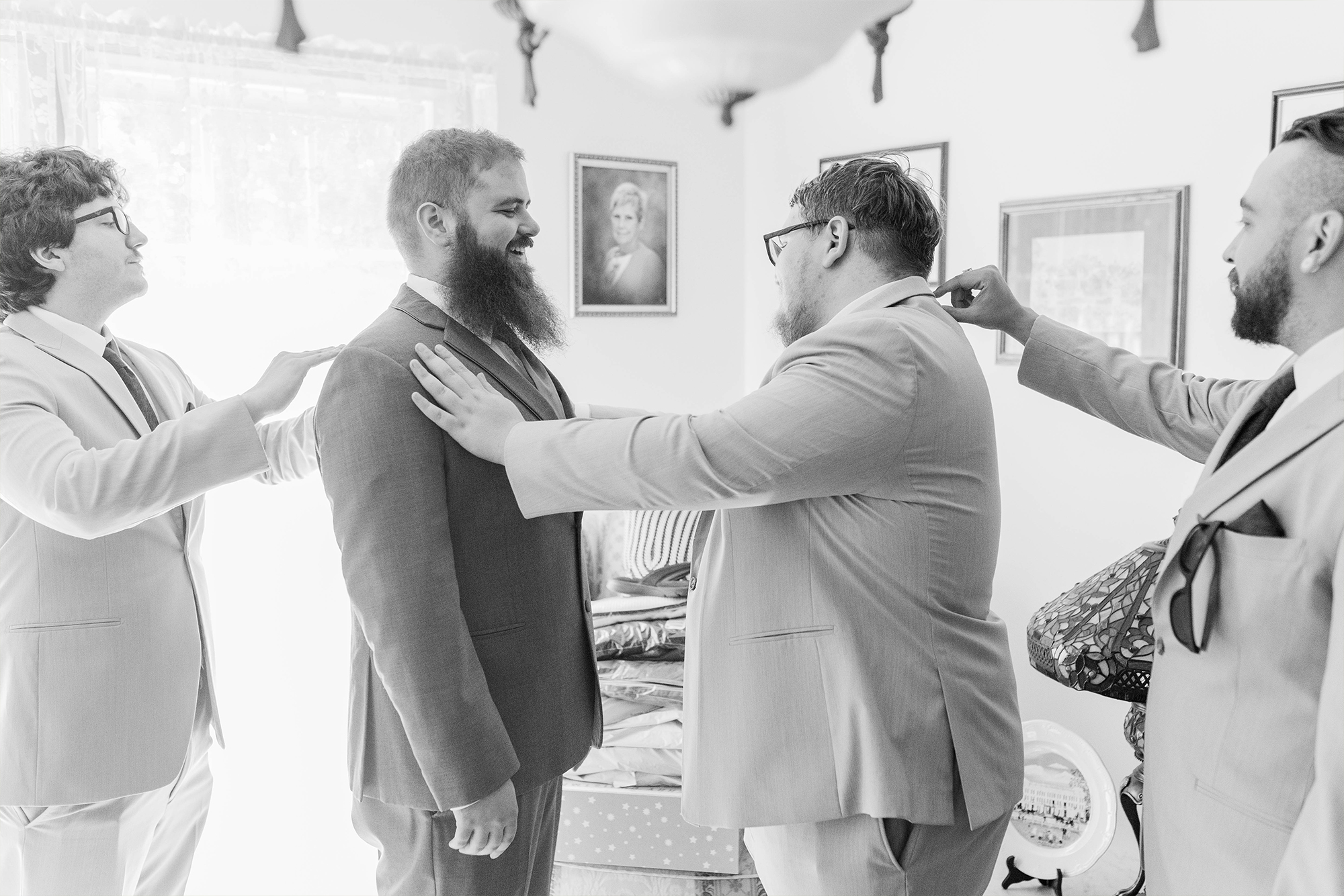 groom and groomsmen getting ready