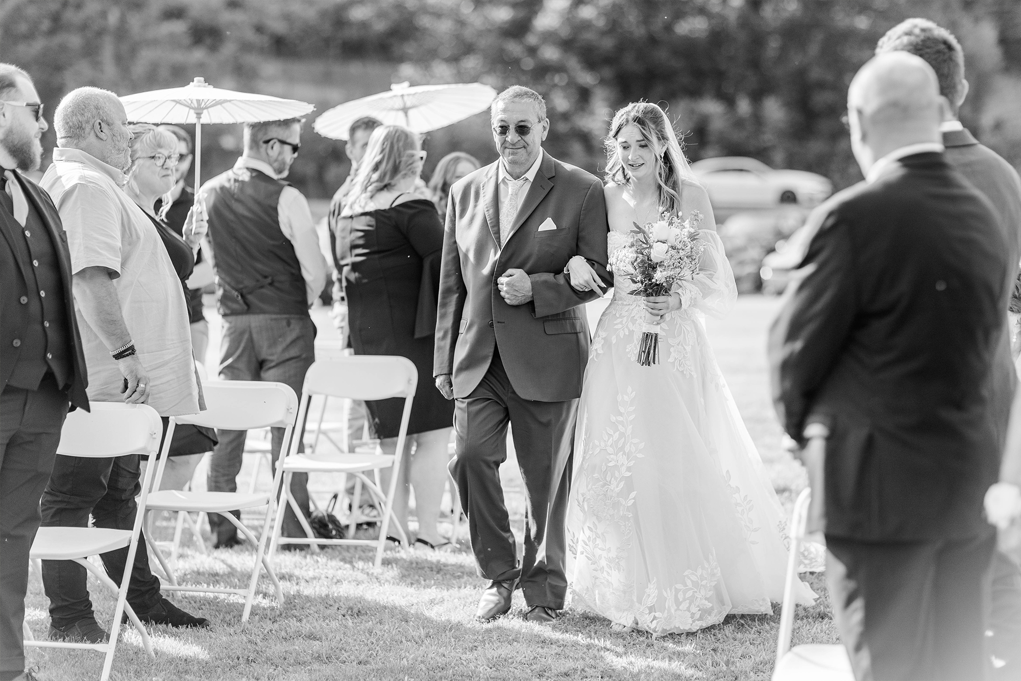 bride and father walking down aisle