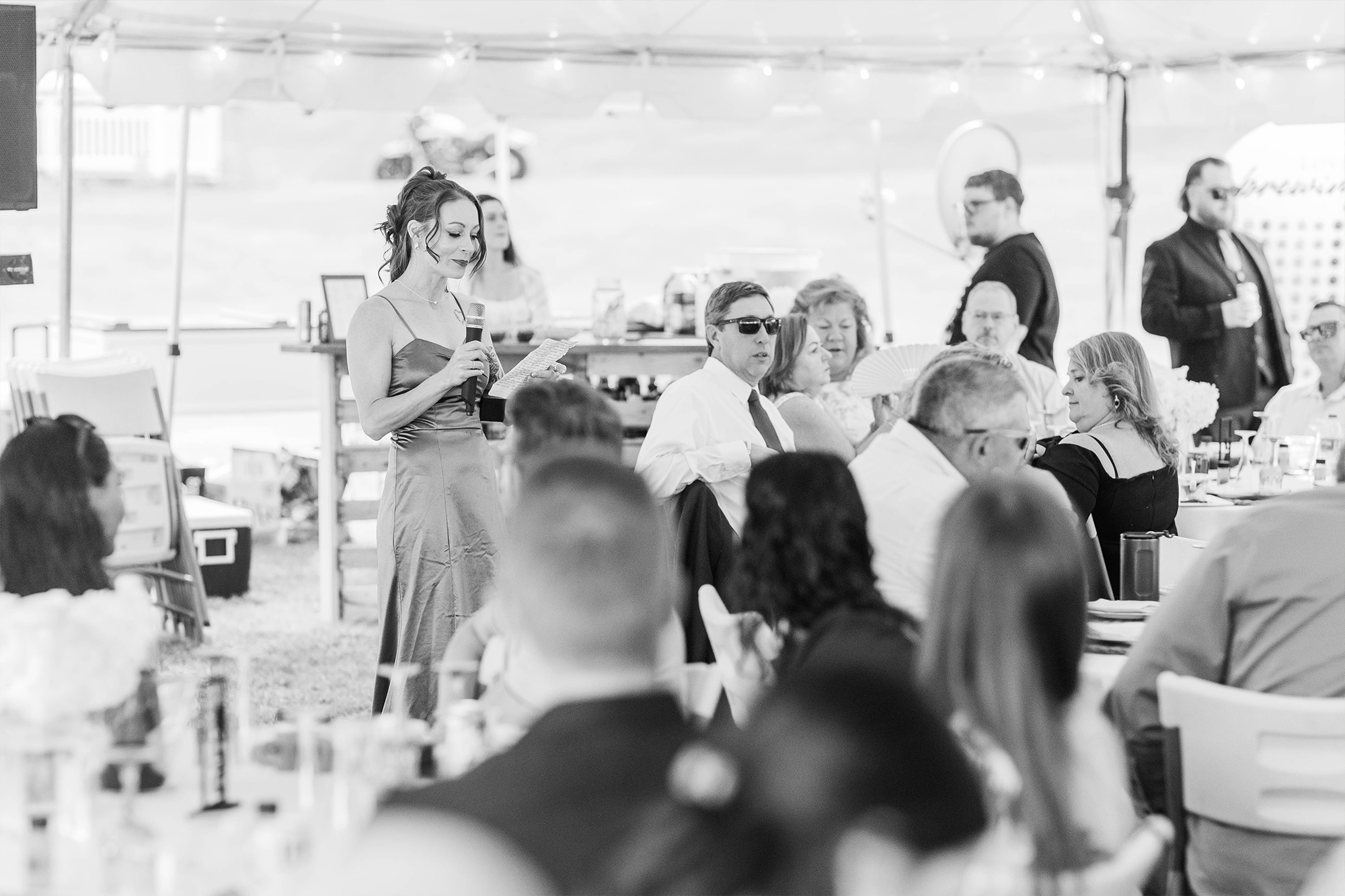 bridesmaids giving toast with guests