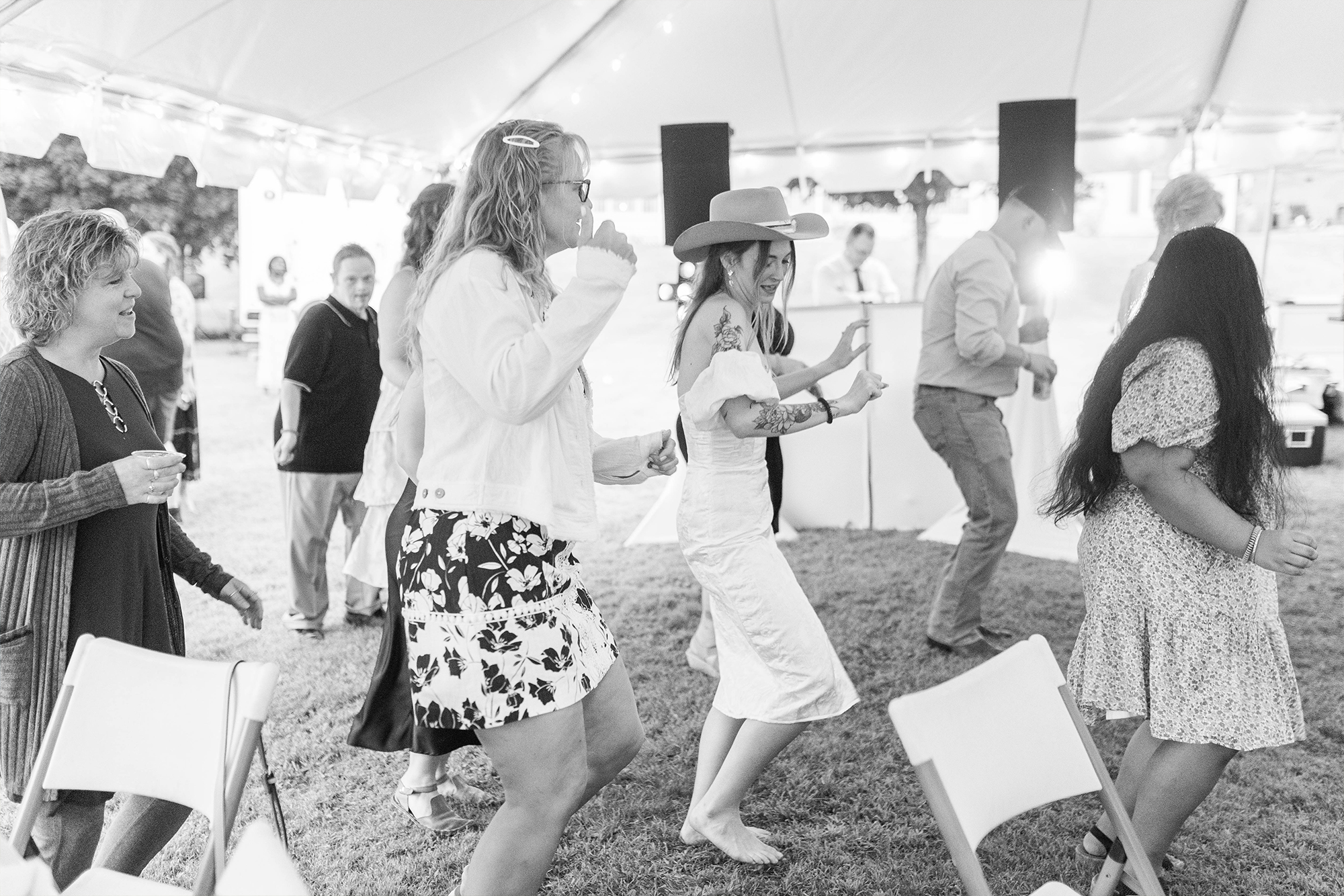 bride dancing with guests and DJ