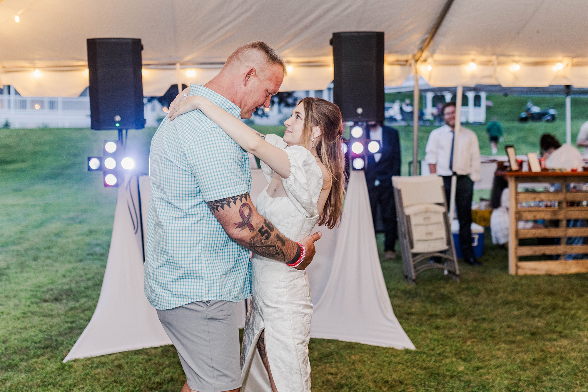 Bride dancing with family member alone