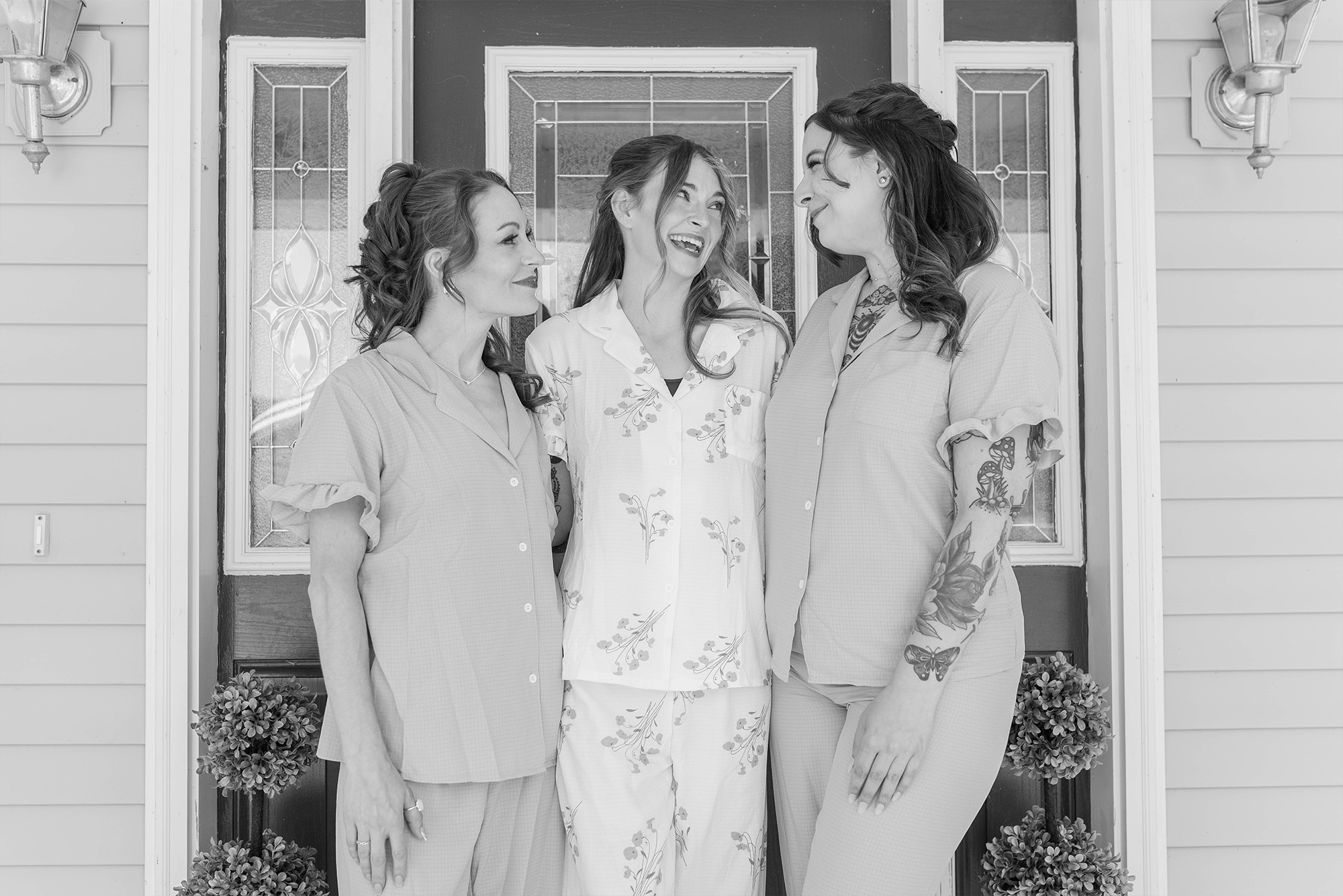 bridesmaids standing on porch