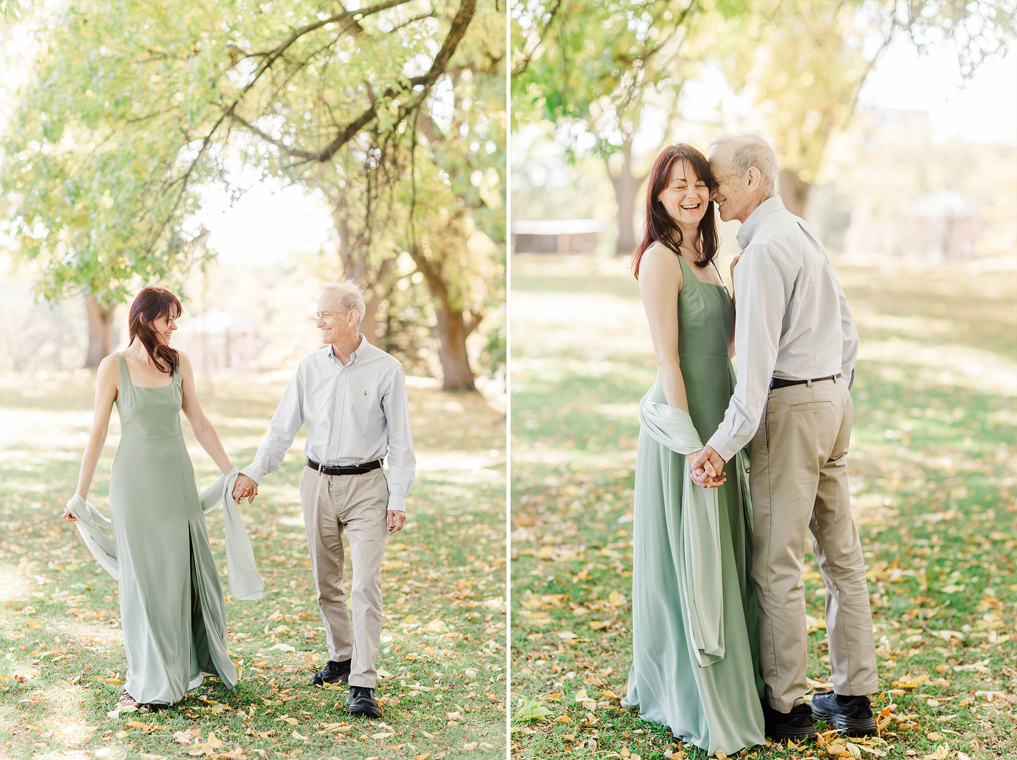 couple walking hand in hand and posing together with fall trees