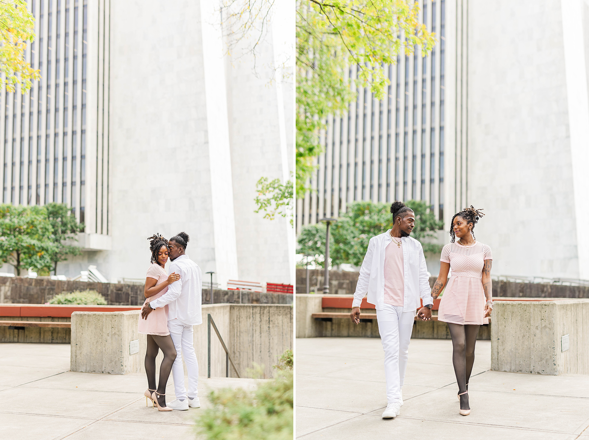 couple posing with each other and walking hand in hand in park with office building