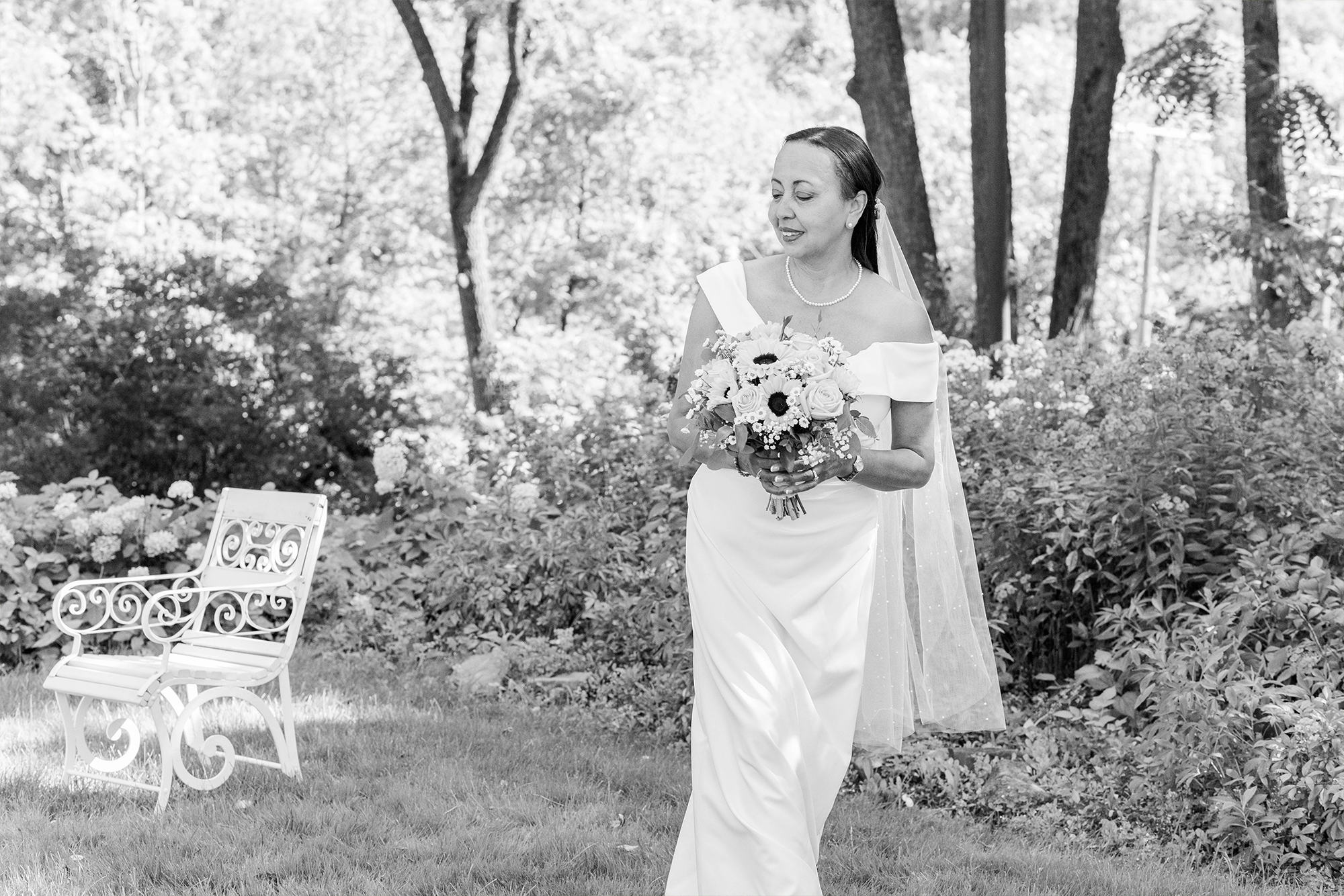 bride walking with bouquet 